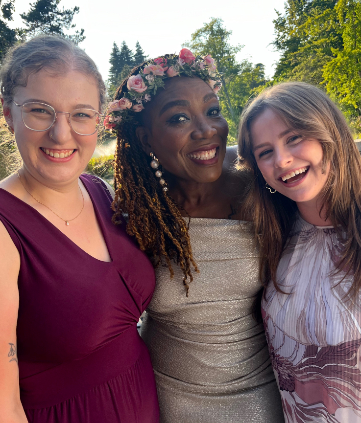 three woman smiling