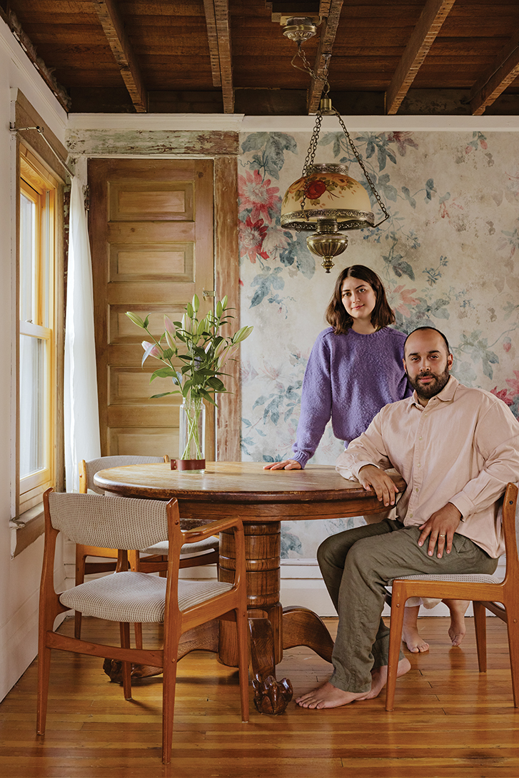 Sean Cunning­ham and Matt Senecal-Junkeer at a dining table 