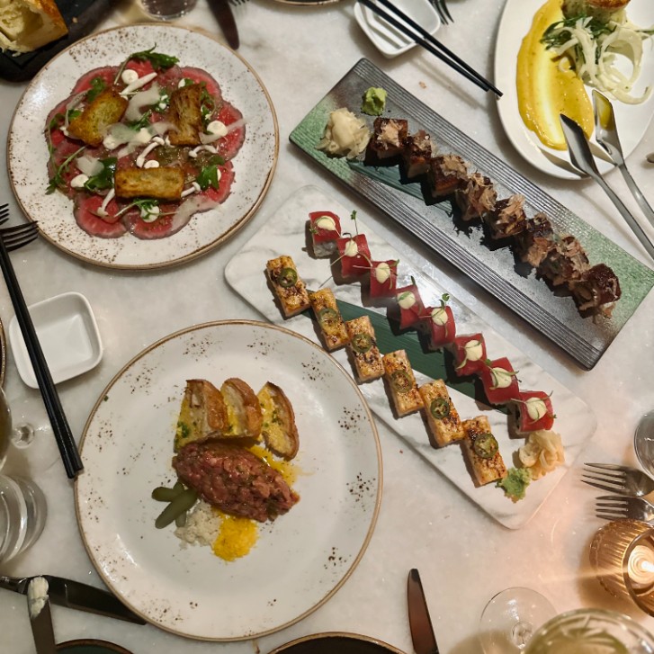 Clockwise from top left: the carpaccio, unagi roll, crab and mango roll, the gringo roll and the tartare.