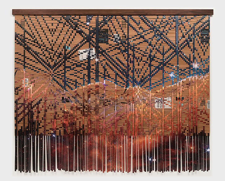Weaving of cardboard Amazon boxes and images of outer space.